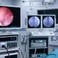 Modern endoscopy suite with advanced urology imaging systems and multiple diagnostic monitors